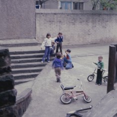 Children and bikes, Broomhall Flats play area. July 1978 | Photo: Tony Allwright
