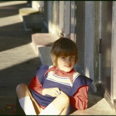 Girl on doorstep, Broomhall Flats. July 1978 | Photo: Tony Allwright