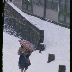 Pedestrian in the snow, Broomhall Flats. March 1979 | Photo: Tony Allwright