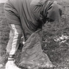 Young person gathering garden waste. 1992 | Photo: Broomhall Centre