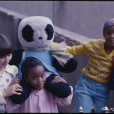 Three girls and a bear, Broomhall Flats. July 1978 | Photo: Tony Allwright