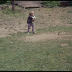 Boy holding ball, Broomhall Flats. July 1978 | Photo: Tony Allwright