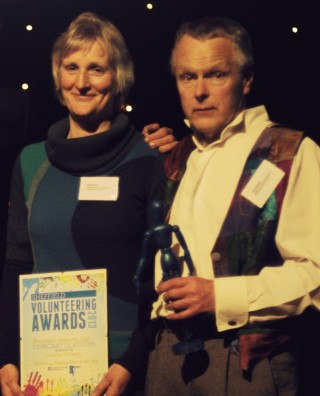 Polly and Tony receiving their Volunteering Award, 2013