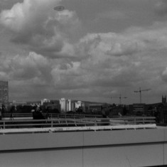 Volunteers on the roof of the Hanover Flats. August 2014 | Photo: Jepoy Sotomayor